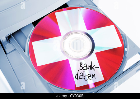 CD mit Schweizer Kreuz, symbolisches Bild für Schweizer Bankdaten Stockfoto