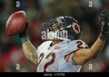 RB Matt Forte, #22 Chicago Bears, celebrates a touchdown during the NFL  International game between the Tampa Bay Buccaneers and the Chicago Bears  on O - SuperStock