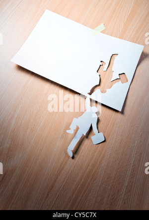 Das Konzept-Bild, werden das Papier Person versucht gehalten werden. Stockfoto