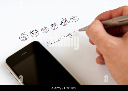 Handschrift-social-Networking mit modernen Smartphone angeordnet Stockfoto