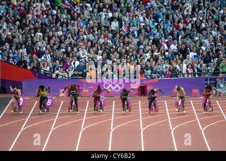 Start der Frauen 100m Halbfinale bei den Olympischen Sommerspielen 2012 in London Stockfoto