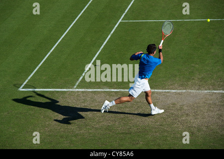 Marinko Matosevic in Aktion spielen einzelne reichte daher Hand geschossen. Stockfoto