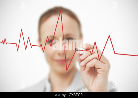 Geschäftsfrau Zeichnung ECG-Linie Stockfoto