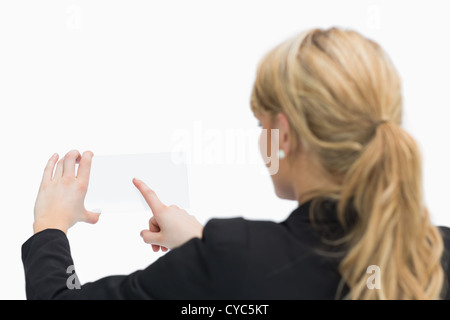 Frau Scheibe zu berühren Stockfoto