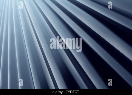 Glänzende Metall Radial Hintergrund gemacht von malte gebogene Aluminium Stahlblech nachschlagen als Gestaltungselement für moderne Architektur und neue Alter outdoor Baumaterial Bau. Stockfoto