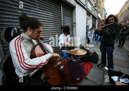 Straße Buskers, Brick Lane, London Stockfoto