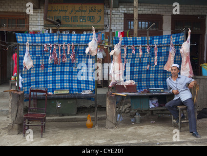 Uyghur Metzger In Keriya, Altstadt, Xinjiang Uyghur autonome Region, China Stockfoto