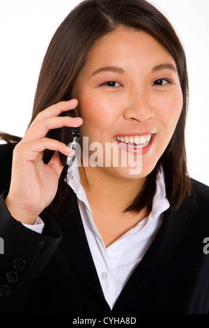 asiatische Geschäftsfrau mit mobile Stockfoto