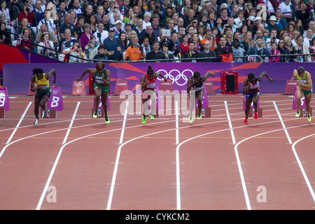 Start der Frauen 100-Meter-Halbfinale bei den Olympischen Sommerspielen 2012 in London Stockfoto