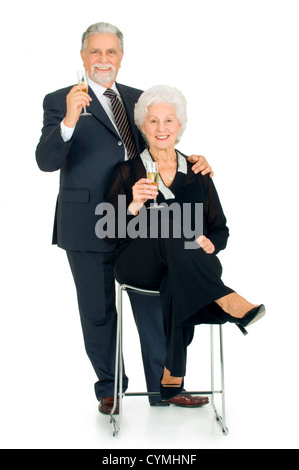 elegante älteres Ehepaar Toasten Stockfoto