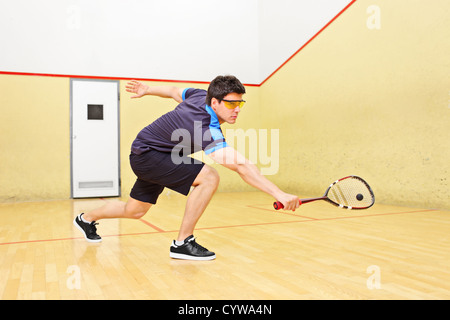 Eine Kollision mit einem Ball in einen Squash-Court Squashspieler Stockfoto