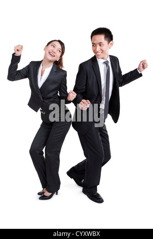 Glücklich Büroangestellte tanzen Stockfoto