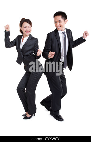 Glücklich Büroangestellte tanzen Stockfoto