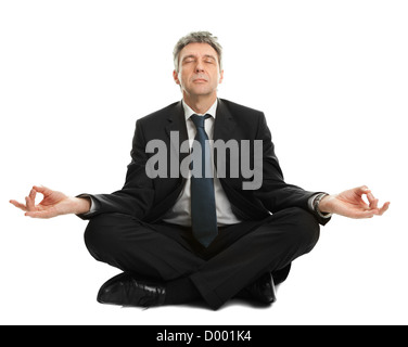 Unternehmer im Yoga Position sitzen Stockfoto