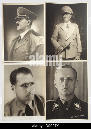 Sammlung von 36 großformatigen Portraitfotos von führenden Mitgliedern der NSDAP, Adolf Hitler: Bild nach einem Gemälde (24 x 17.5). Hermann Göring: 18 Bilder in verschiedenen Größen(2 in 40 x 30,5 in 30 x 24,7 in 24 x 18,1 in 21.5 x 16.5,3 in 18 x 13),meist aufgenommen von Röhr oder Hoffmann,auch ein frühes Foto in Jagdkleidung,als Reichsmarschall,in Uniform als Reichsjägermeister(drei Bilder von Röhr),in SA-Uniform mit PLM,teilweise gestempelt oder identisch Kopien. Rudolf Heß: Ein portra historisch,historisch,Menschen,1930er,1930er,20th century,NS,National,Additional-Rights-Clearences-nicht vorhanden Stockfoto