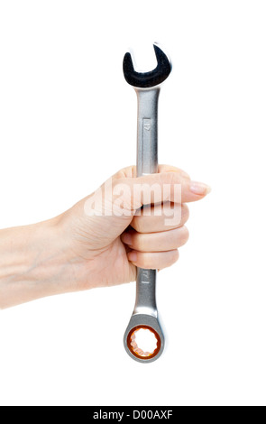 Frau Hand mit einem Chrom-Schraubenschlüssel. Isolieren Sie auf weiß. Stockfoto