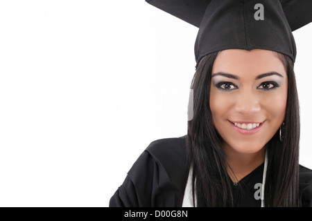 Bildung Thema: Studium Studentin in einem akademischen Kleid. Isoliert auf weißem Hintergrund. Stockfoto