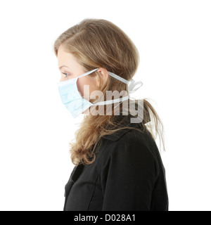 Ein Modell mit einer Maske um Schweine-Grippe-Infektion zu verhindern. Stockfoto