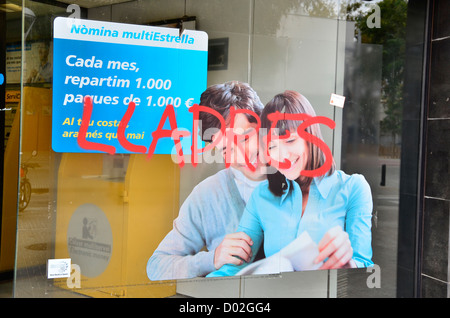 Niederlassung der Bank (Caixabank) mit einem Tag: Diebe, schlagen im allgemeinen 14 Novembre 2012 in Barcelona Stockfoto