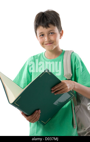 Entzückenden Kind ein Buch zu lesen, auf einem über weißer Hintergrund Stockfoto