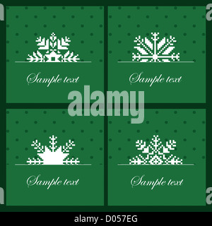 Vier Karten mit Schneeflocken auf grünem Hintergrund Stockfoto