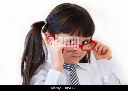 Das Mädchen von fünf Jahren mit roten Punkten Stockfoto