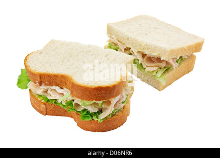 Ein Schinkenbrot, Salat mit frisch geschnittenem Brot halbieren mit Fokus auf die Füllung gemacht Stockfoto