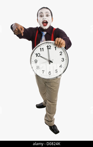 MIME, zeigt eine Uhr Stockfoto