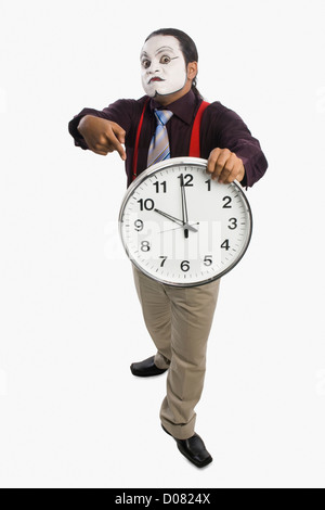 MIME, zeigt eine Uhr Stockfoto