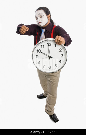 MIME, zeigt eine Uhr Stockfoto