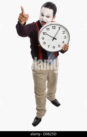 MIME, zeigt eine Uhr Stockfoto