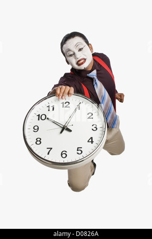 MIME, zeigt eine Uhr Stockfoto