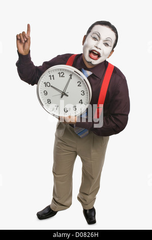 MIME, zeigt eine Uhr Stockfoto