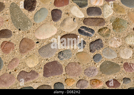 Bunten Felsen und Steinen im Sand Hintergrund Stockfoto