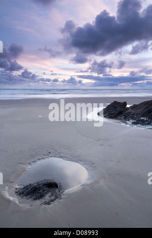 Sonnenuntergang über Treganhawke Strand Whitsand Bay Cornwall UK Stockfoto