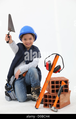 Kleiner Junge gekleidet als builder Stockfoto