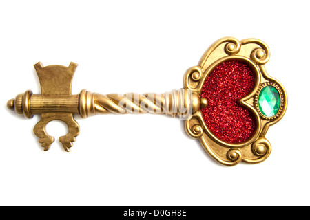 Golden Fantasy Schlüssel mit rotem Glitter Herzen isoliert auf weiß Stockfoto