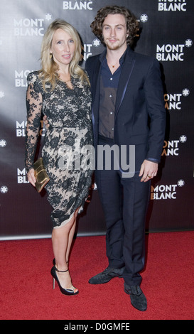 SamTaylor-Holz und Aaron Johnson Global Launch The Montblanc John Lennon Edition und Screening von "Nowhere Boy" - Ankünfte Stockfoto