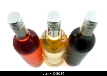 Three bottles of wine isolated over white Stockfoto