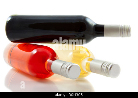 Three bottles of wine isolated over white Stockfoto