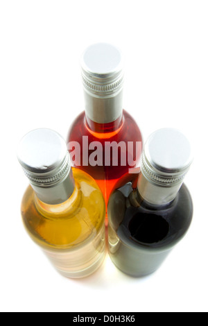 Three bottles of wine isolated over white Stockfoto