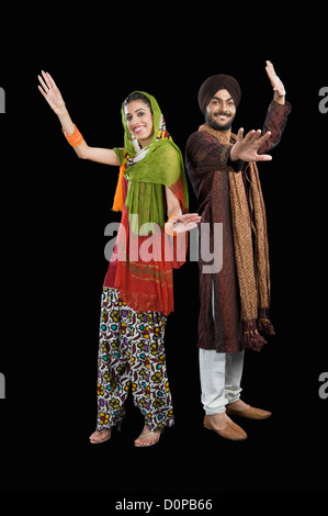 Porträt von einem Sikh Paare tanzen Stockfoto