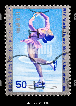 Briefmarke aus Japan zeigt eine Abbildung Skater, für die 1977 World Figure Skating Championships in Tokio, Japan. Stockfoto