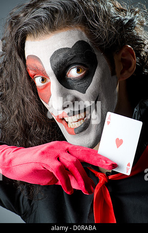 Joker mit Gesichtsmaske im studio Stockfoto