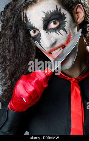 Joker mit Gesichtsmaske im studio Stockfoto