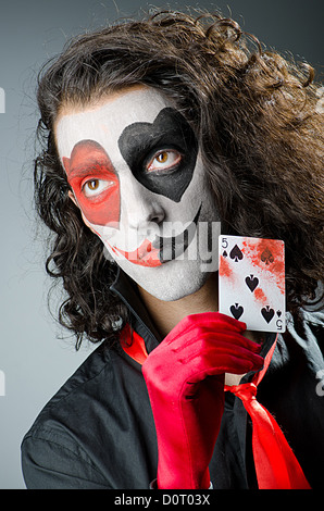 Joker mit Gesichtsmaske im studio Stockfoto