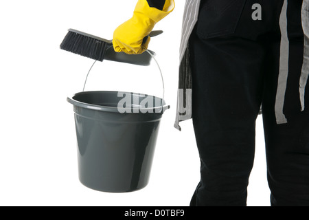 Detail der Putzfrau mit Eimer und Schaufel und Pinsel Stockfoto