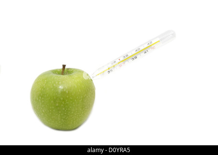 Grüner Apfel und eine medizinische thermomet Stockfoto