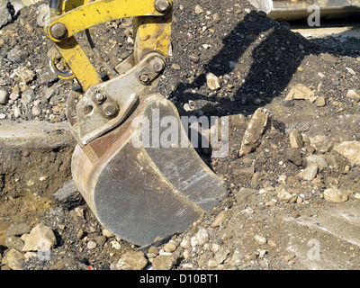 Schaber, ganz ein Baustellen bei den Grabungen für die Verlegung von Rohren zu arbeiten Stockfoto