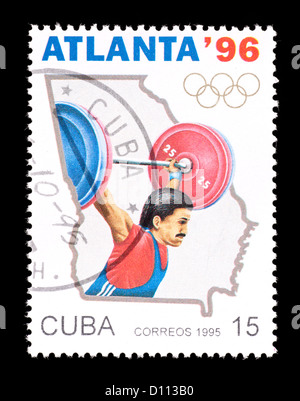 Briefmarke aus Kuba, die Darstellung eines Gewichthebers. Stockfoto